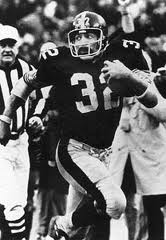 Franco Harris running with the Immaculate Reception